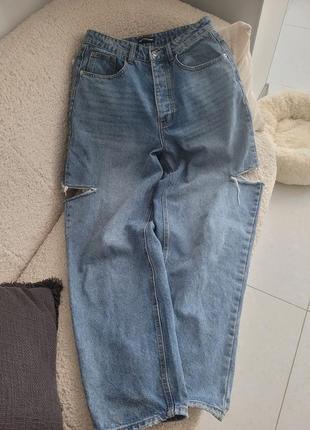Крутые джинсы с разрезами6 фото