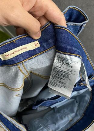 Блакитні джинси від бренда levi's6 фото