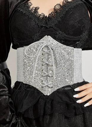 Широкий блискучий пояс-корсет на шнурівці 1610