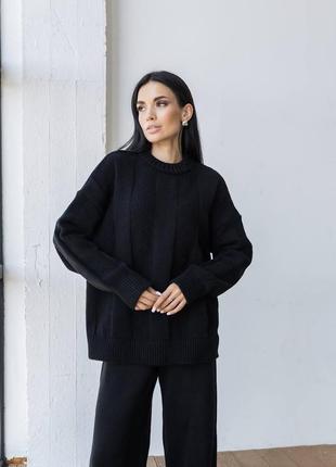 Объемный вязаный костюм с брюками палаццо