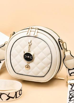 Женская сумочка клатч круглая стеганная с брелком. маленькая сумка для девушек