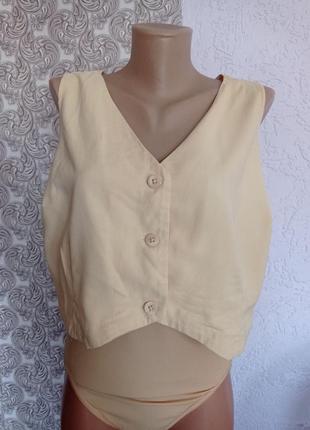 Жіноча жилетка бежевого кольору від primark.