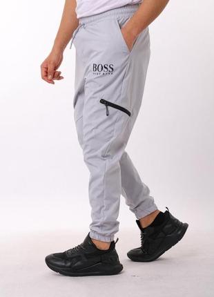 Чоловічі брендові штани з плащівки воss2 фото