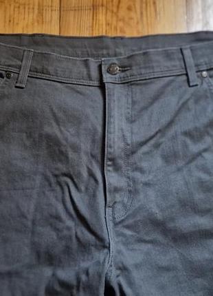 Брендові фірмові  стрейчеві джинси wrangler модель regular fit,оригінал,нові,розмір 42/32.5 фото