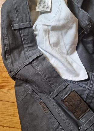 Брендові фірмові  стрейчеві джинси wrangler модель regular fit,оригінал,нові,розмір 42/32.7 фото
