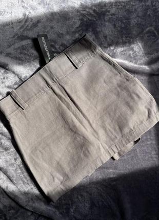 Серая юбка с карманами4 фото