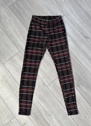 Женские леггинсы в клетку
