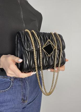 Плісирована чорна сумочка