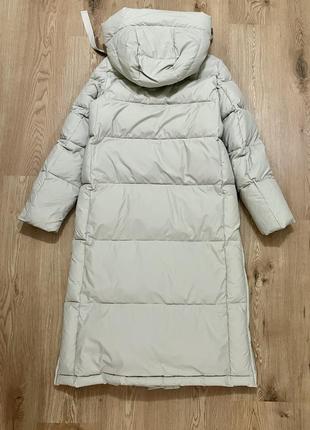 Бежевий теплий пуховик clasna