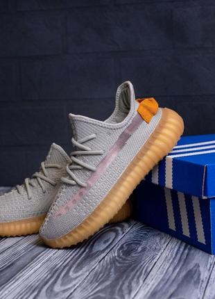 Молодежные женские текстильные кроссовки фирменные adidas yeezy адидас изики серым с оранжевым