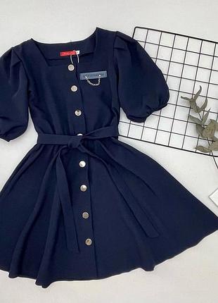 Шкільне плаття на кнопках.