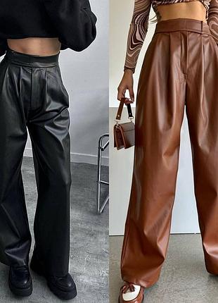 Широкі утеплені штани зі штучної шкіри на флісі з липучкою