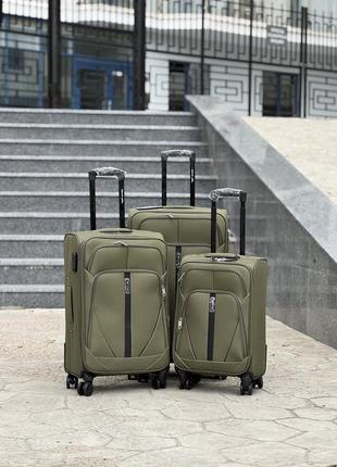 Большой чемодан дорожный тканевый l польша на колесах wings с подшипником