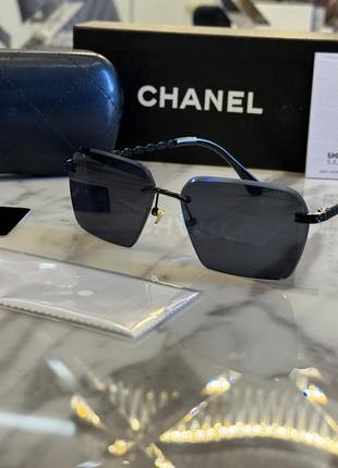 Сонцезахисні чорні окуляри chanel