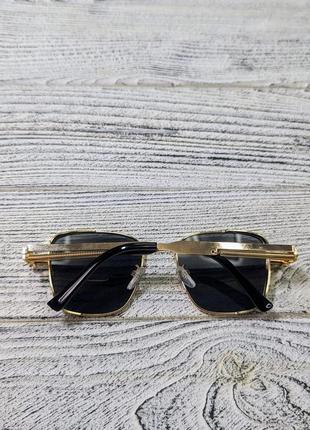 Солнцезащитные очки унисекс, квадратные, черные  в  металлической золотистой оправе ( без бренда )6 фото