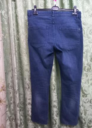 Стрейчевые рваные джинсы