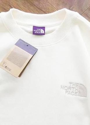 Нова біла кофта у стилі the north face
