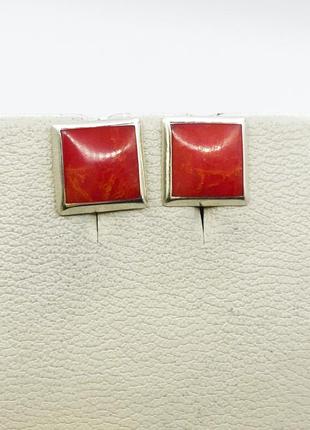 Сережки-гвоздики срібні з коралом 0,92 г