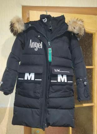 Зимове пальто для дівчинки 140 см