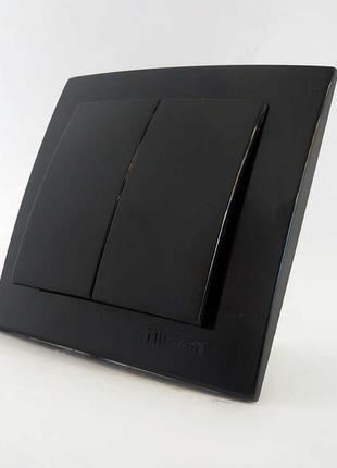 Вимикач nilson touran чорний 2кл