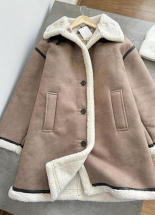 Дублянка з високим коміром zara