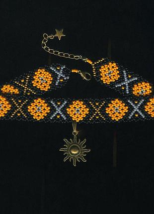 Гердан чекер на шею с подвеской солнышком "autumnal equinox"