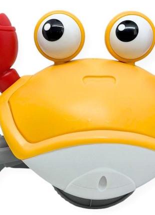 Крабик краб двигается бегает развивающая игрушка для детей с мелодиями и датчитком препятствия желтый