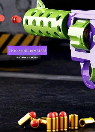 Игрушечный пластиковый револьвер бластер стреляет пластиковыми пулями с гильзой