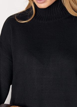 Черное длинное вязаное платье прямого кроя