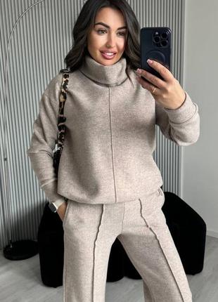 Костюм женский
ткань очень теплая, тянется, не колется
ткань ангора вязкая плотная