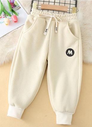 Дитячі теплі зимові вельветові штани на хутрі молочні