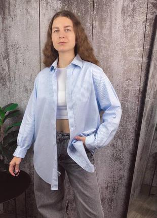 Жіноча блакитна сорочка