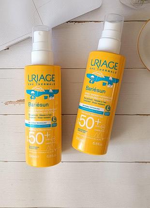 Дитячий сонцезахисний зволожувальний спрей для тіла uriage bariesun moisturuzing kid spray spf 50+1 фото