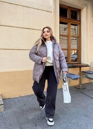 Зимова жіноча куртка