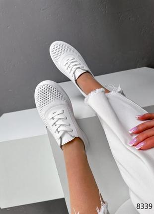 Білі натуральні шкіряні кросівки кеди з наскрізною перфорацією шкіра8 фото