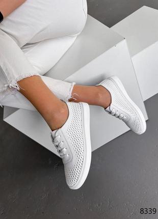 Білі натуральні шкіряні кросівки кеди з наскрізною перфорацією шкіра6 фото