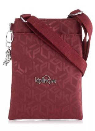Симпатична маленька монограмна сумочка kipling