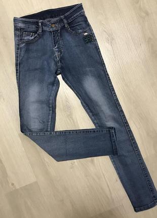 Джинси на дівчину підлітка