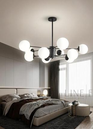 Мінімалістична люстра на 10 білих матових плафонів в чорному корпусі