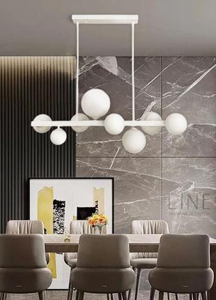 Видовжена біла люстра-молекула на 8 плафонів 75 см