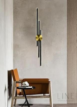 Видовжене бра у чорному корпусі із латунним кругом 93 см