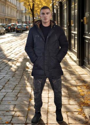 Зимняя удлиненная куртка на молнии с кнопками с капюшоном с карманами