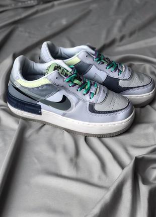 Сірі з синім жіночі кросівки nike air force 1 shadow se