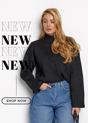 Чорний светр із рваним декором