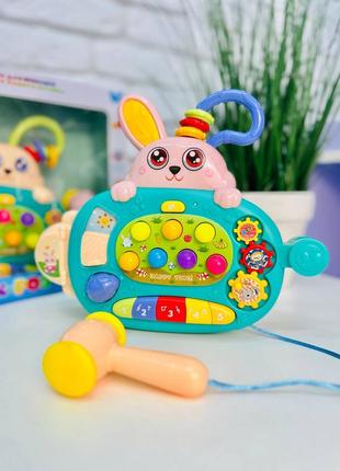 Развивающая игрушка зайчик-развивайчик для детей