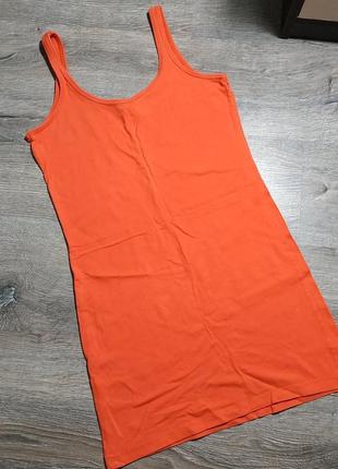 Подовжена світла майка спідня під одяг чи для сну/дому тощо.