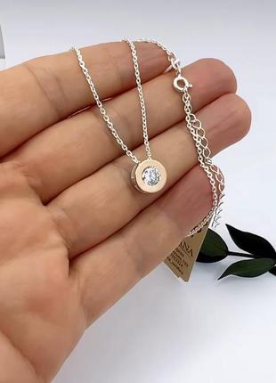 Серебряное колье с золотыми вставками