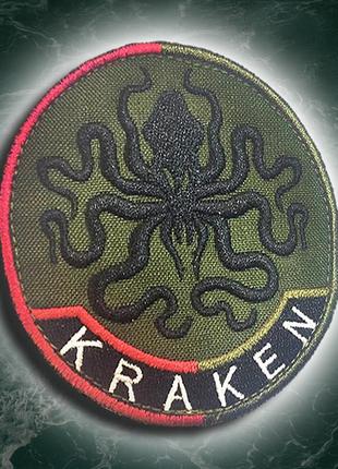 №127 шеврон kraken (форма коло. фон олива) розмір 8 см