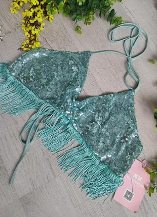 Топ бирюзового блакитного кольору стан новий 
по бірці вказаний розмір s