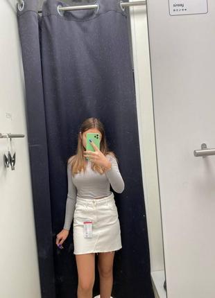 Біла джинсова спідниця